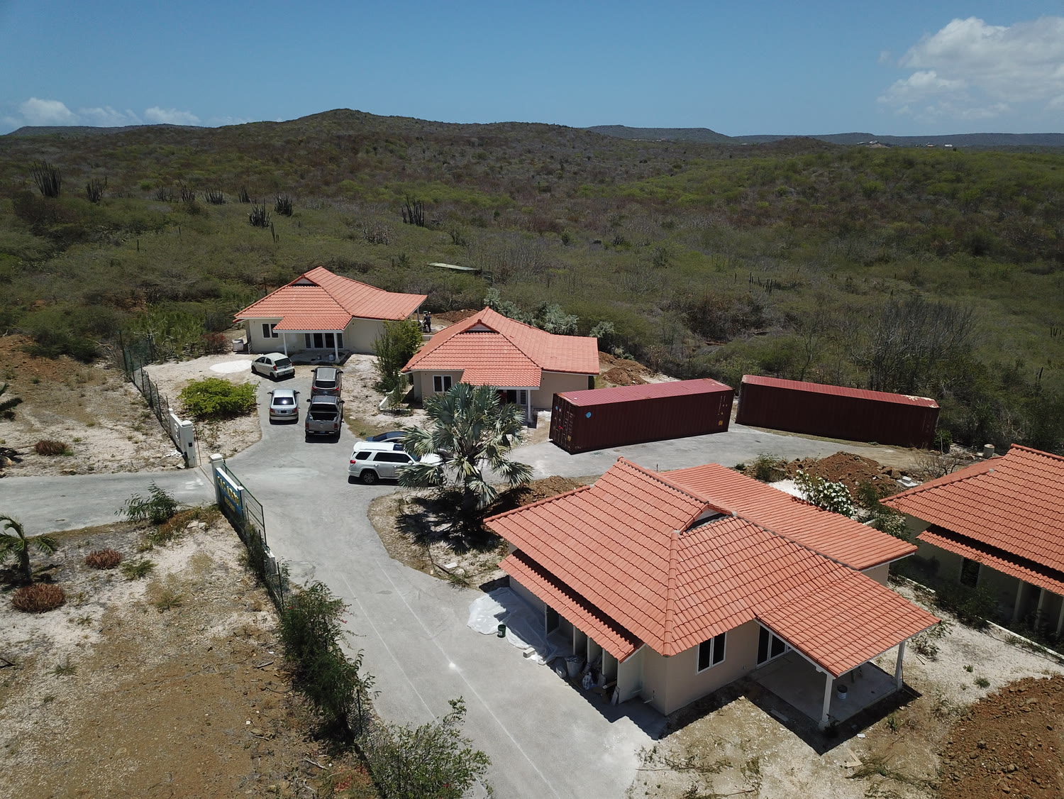 The villas with clay tile roofs in the surrounding landscape